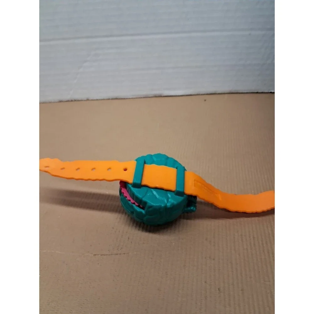 1996 Wendy's Kids Meal Toy Pre Historic Style Wrist Orange & Green